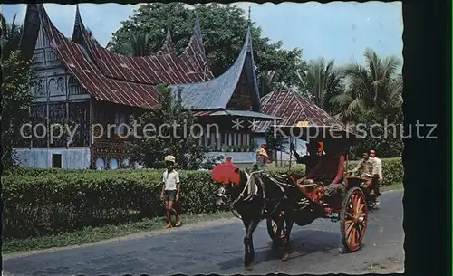 Sumatra Sumatera Horsecart traditional Minankabau vehicle with traditional house