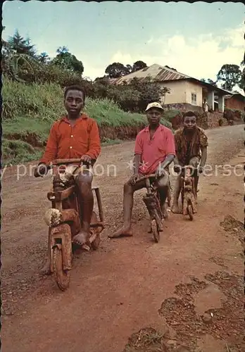 Typen Afrika Boys riding self made wooden cycles Nso Bui Division