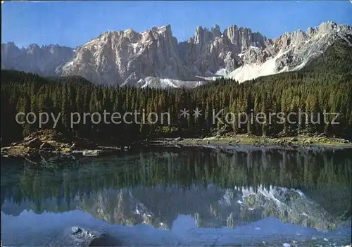 Karersee Suedtirol Lago di Carezza Latemar Dolomiten Wasserspiegelung Kat. Welschnofen