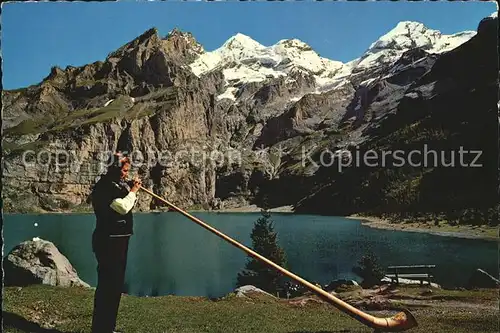 Alphorn Alphornblaeser Oeschinensee Kandersteg Bluemlisalpgruppe  Kat. Musik