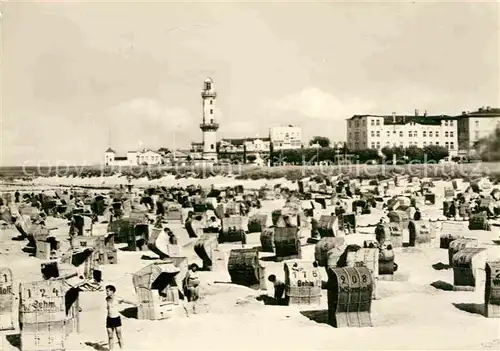 Warnemuende Ostseebad Strand mit Leuchtturm Kat. Rostock