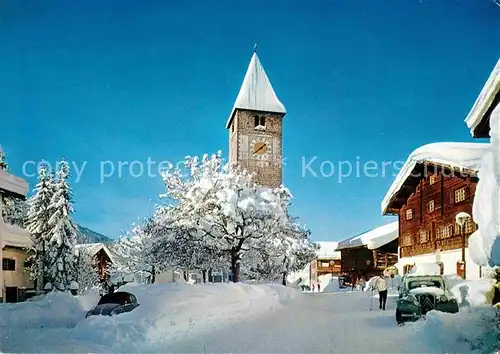 Klosters GR Dorfpartie im Winter St Jakobskirche Altes Rathaus Kat. Klosters