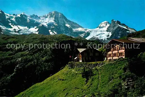 Obersteinberg Bergdorf mit Breithorn Tschingelhorn Wetterhorn Berner Alpen