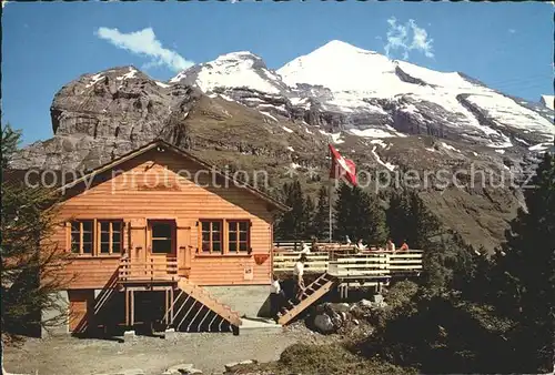 AK / Ansichtskarte Kandersteg BE Bergrestaurant Sunnbuehl Flagge Altels Tatlishoerner Berner Alpen Kat. Kandersteg