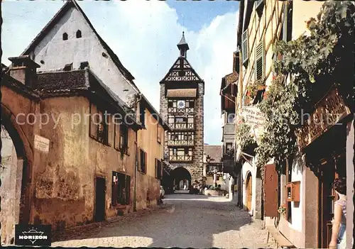 AK / Ansichtskarte Riquewihr Haut Rhin Le Dolder Turm mit Gasse Kat. Riquewihr