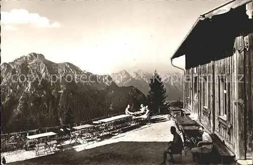 AK / Ansichtskarte Tegelberghaus Terrasse mit Saeuling Gernspitze Koellespitze Schlicke Alpenpanorama Kat. Fuessen