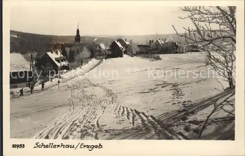 AK / Ansichtskarte Schellerhau Ortsansicht mit Kirche im Winter Hoehenluftkurort Kat. Altenberg