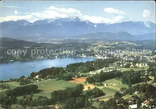 AK / Ansichtskarte Velden Woerther See Panorama mit Mittagskogel Karawanken Kat. Velden am Woerther See