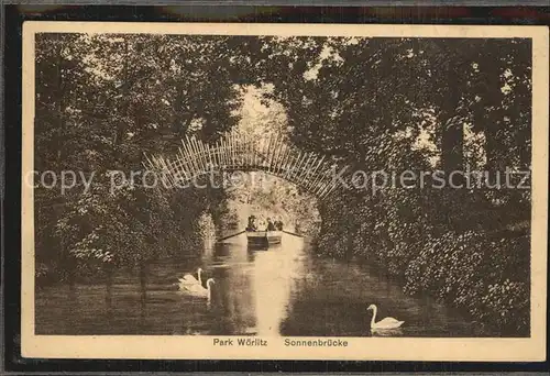 AK / Ansichtskarte Woerlitz Woerlitzer Park Sonnenbruecke Schwaene Kat. Woerlitz