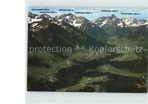 AK / Ansichtskarte Kleinwalsertal mit Blick auf Riezlern Hirschegg und Mittelberg Alpenpanorama Fliegeraufnahme Kat. Oesterreich