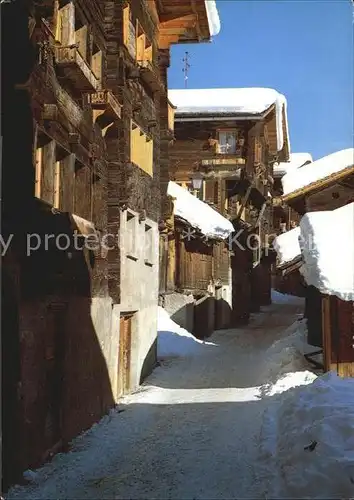 AK / Ansichtskarte Grimentz Dans le village en hiver Dorfpartie im Winter Kat. Grimentz