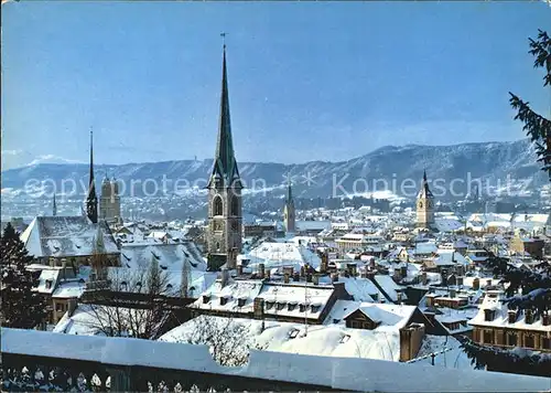 AK / Ansichtskarte Zuerich ZH Stadtbild im Winter Kirchen Alpen