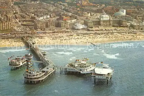 AK / Ansichtskarte Scheveningen Pier Seebruecke Strand Fliegeraufnahme Kat. Scheveningen