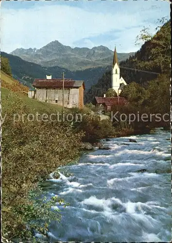 AK / Ansichtskarte Silbertal mit Lobspitze Bachlauf Kirche Kat. Silbertal