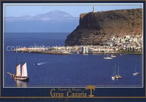 AK / Ansichtskarte Mogan Hafen Segelboot Steilkueste Fliegeraufnahme Kat. Gran Canaria Spanien