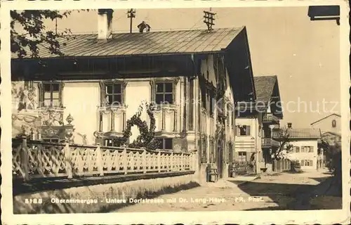 AK / Ansichtskarte Oberammergau Untere Dorfstrasse mit Dr Lang Haus Kat. Oberammergau