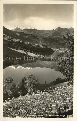 AK / Ansichtskarte Lungern Lungernsee mit Wetterhorngruppe Alpenpanorama Kat. Lungern