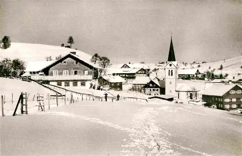 AK / Ansichtskarte Steibis Ortsansicht mit Kirche Winterpanorama Kat. Oberstaufen