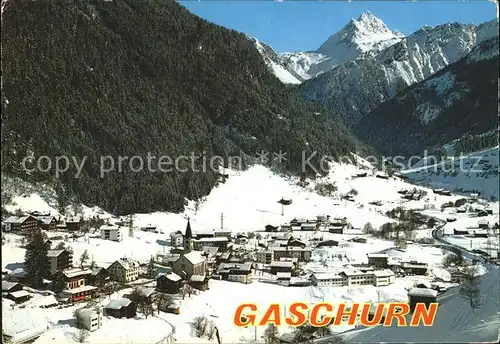 AK / Ansichtskarte Gaschurn Vorarlberg Winterpanorama gegen Valluela Montafon Kat. Gaschurn