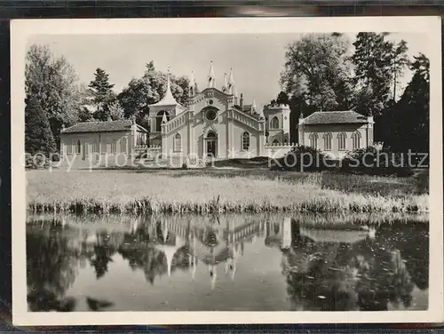 AK / Ansichtskarte Woerlitz Woerlitzer Park Gotisches Haus See Wasserspiegelung Kat. Woerlitz