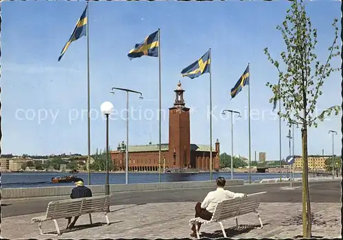 AK / Ansichtskarte Stockholm Stadshuset fran Riddarholmen Rathaus Schwedische Flagge Kat. Stockholm