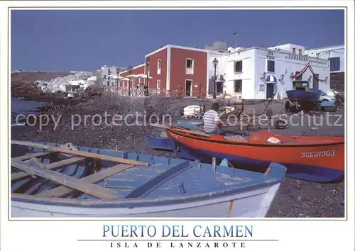 AK / Ansichtskarte Puerto del Carmen Fischerboote am Strand Kanarische Architektur Kat. Tias Lanzarote