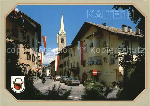 AK / Ansichtskarte Kaltern Caldaro Dorfstrasse Kirchturm Fahnen Kat. Kaltern am See Suedtirol