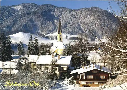 AK / Ansichtskarte Schliersee Ortsansicht mit Kirche Winterpanorama Kat. Schliersee