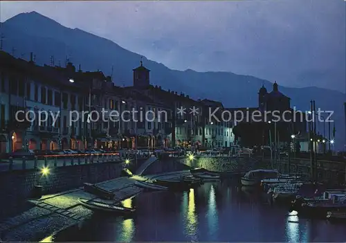 AK / Ansichtskarte Cannobio Lago Maggiore Il porto di notte Hafen bei Nacht Kat. Italien