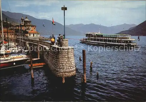 AK / Ansichtskarte Cannobio Lago Maggiore Hafen Passagierdampfer Alpen Kat. Italien