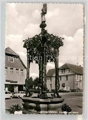 AK / Ansichtskarte Springe Deister Brunnen am Markt Kat. Springe