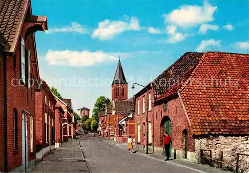 AK / Ansichtskarte Zeddam Beneden en Bovendoerpstraat met RK Kerk en Torenmolen