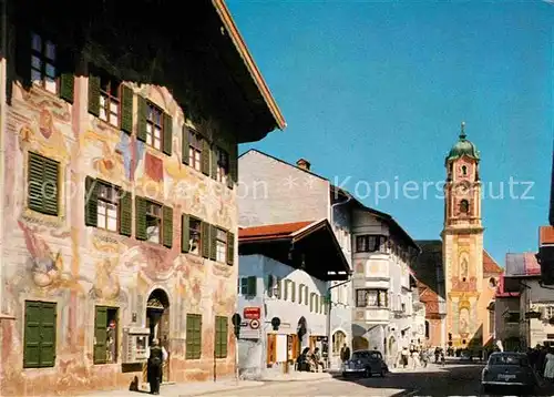 AK / Ansichtskarte Mittenwald Bayern Dorfstrasse mit Neunerhaus gegen Pfarrkirche Huber Karte Nr 8191 Kat. Mittenwald