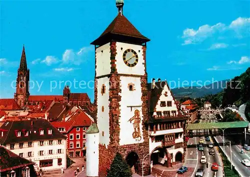 AK / Ansichtskarte Freiburg Breisgau Schwabentor Muenster Altstadt Kat. Freiburg im Breisgau