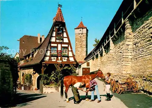 AK / Ansichtskarte Rothenburg Tauber Alte Schmiede Fachwerkhaus Turm Kat. Rothenburg ob der Tauber