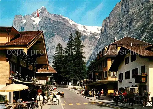 AK / Ansichtskarte Grindelwald Hotel Bellevue und Bazar Steuri mit Wetterhorn Berner Alpen Kat. Grindelwald