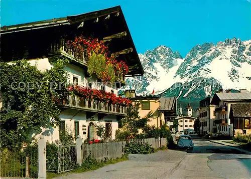 AK / Ansichtskarte Kitzbuehel Tirol Strassenmotiv Ehrenbachgasse mit Infeldhaus Wilder Kaiser Kat. Kitzbuehel
