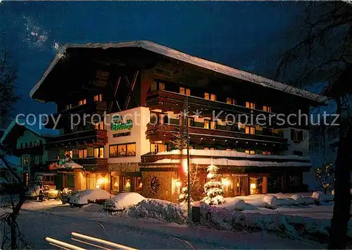 AK / Ansichtskarte Saalbach Hinterglemm Bauers Hotel Edelweiss Weihnachtszeit Nachtaufnahme Kat. Saalbach Hinterglemm