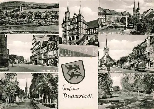 AK / Ansichtskarte Duderstadt Rathaus Kirche Marktstrasse Wallanlagen Strassenpartien Kat. Duderstadt