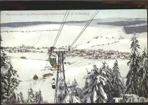 AK / Ansichtskarte Oberwiesenthal Erzgebirge Personen Seilschwebebahn nach dem Fichtelberg Winterpanorama Bahnpost Kat. Oberwiesenthal