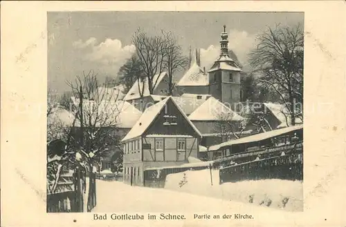 AK / Ansichtskarte Bad Gottleuba Berggiesshuebel im Schnee Partie an der Kirche Kat. Bad Gottleuba Berggiesshuebel