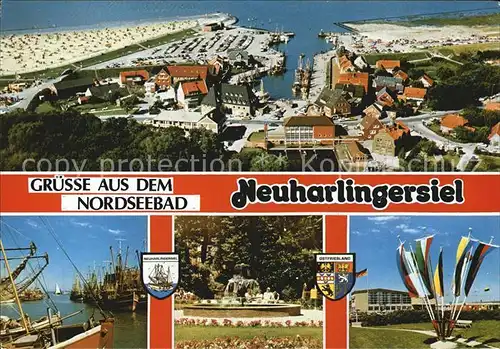 AK / Ansichtskarte Neuharlingersiel Nordseebad Hafen Fischkutter Brunnen Fahnen Fliegeraufnahme Kat. Neuharlingersiel