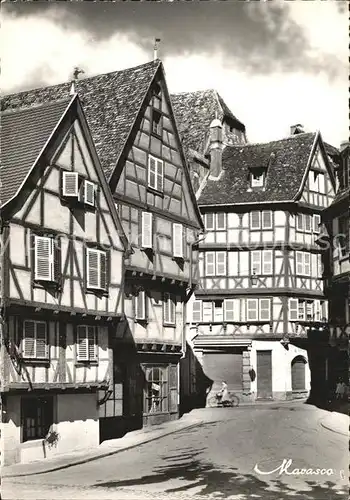 AK / Ansichtskarte Colmar Haut Rhin Elsass Rue des Marchands vieilles maisons Fachwerkhaeuser Kat. Colmar