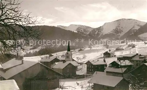 AK / Ansichtskarte Steibis Ortsansicht mit Kirche Winterpanorama Allgaeuer Alpen Kat. Oberstaufen