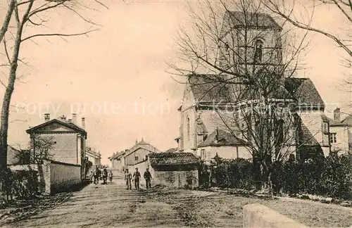 AK / Ansichtskarte Saint Masmes Strassenpartie mit Kirche Kat. Saint Masmes