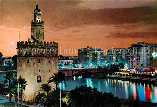 AK / Ansichtskarte Sevilla Andalucia Torre del Oro Rio Guadalquivir de noche Kat. Sevilla 