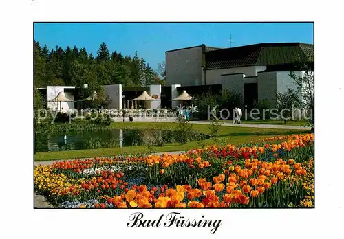 AK / Ansichtskarte Bad Fuessing Thermalbad mit drei Mineralquellen Teich Blumenbeet Tulpen Kat. Bad Fuessing