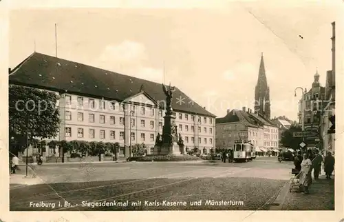 Strassenbahn Freiburg im Breisgau Siegesdenkmal Karls Kaserne Muensterturm Kat. Strassenbahn