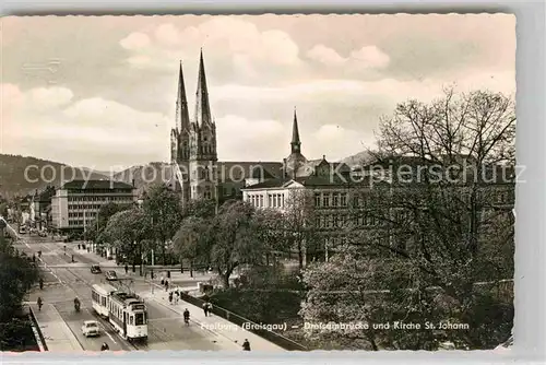 AK / Ansichtskarte Strassenbahn Freiburg im Breisgau Dreisambruecke Kirche St. Johann  Kat. Strassenbahn