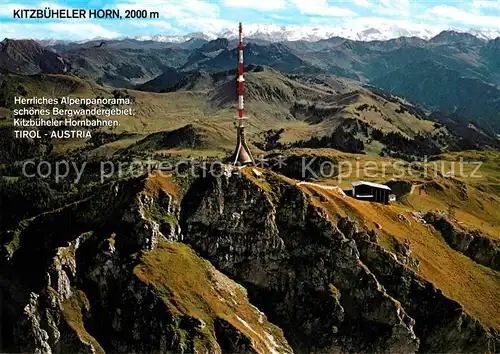 AK / Ansichtskarte Kitzbuehel Tirol Kitzbueheler Horn Gipfelhaus Bergrestaurant Motiv mit Zentralalpen Fliegeraufnahme Kat. Kitzbuehel